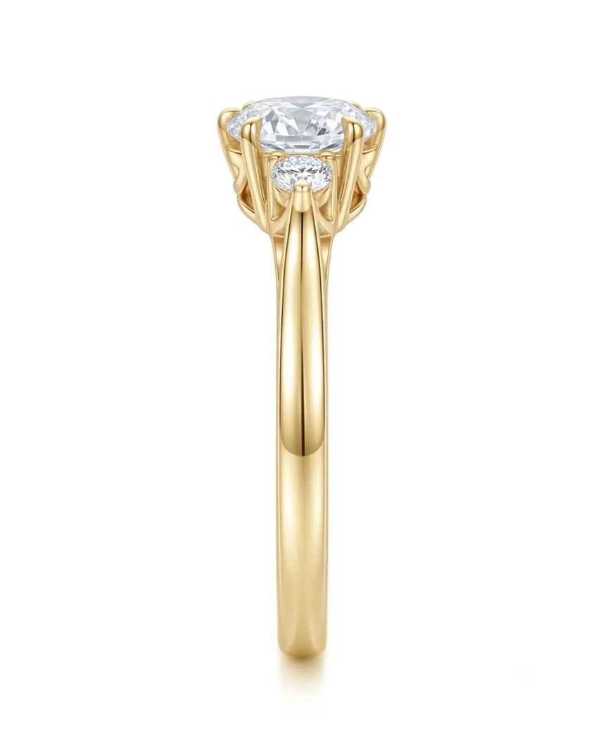 Luxury round moissanite ring with open gallery and rich yellow gold band | SARATTI