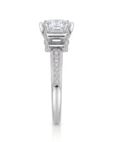 Luxury round moissanite ring with pavé accents and architectural fleur-de-lis gallery crafted in 18K white gold | SARATTI