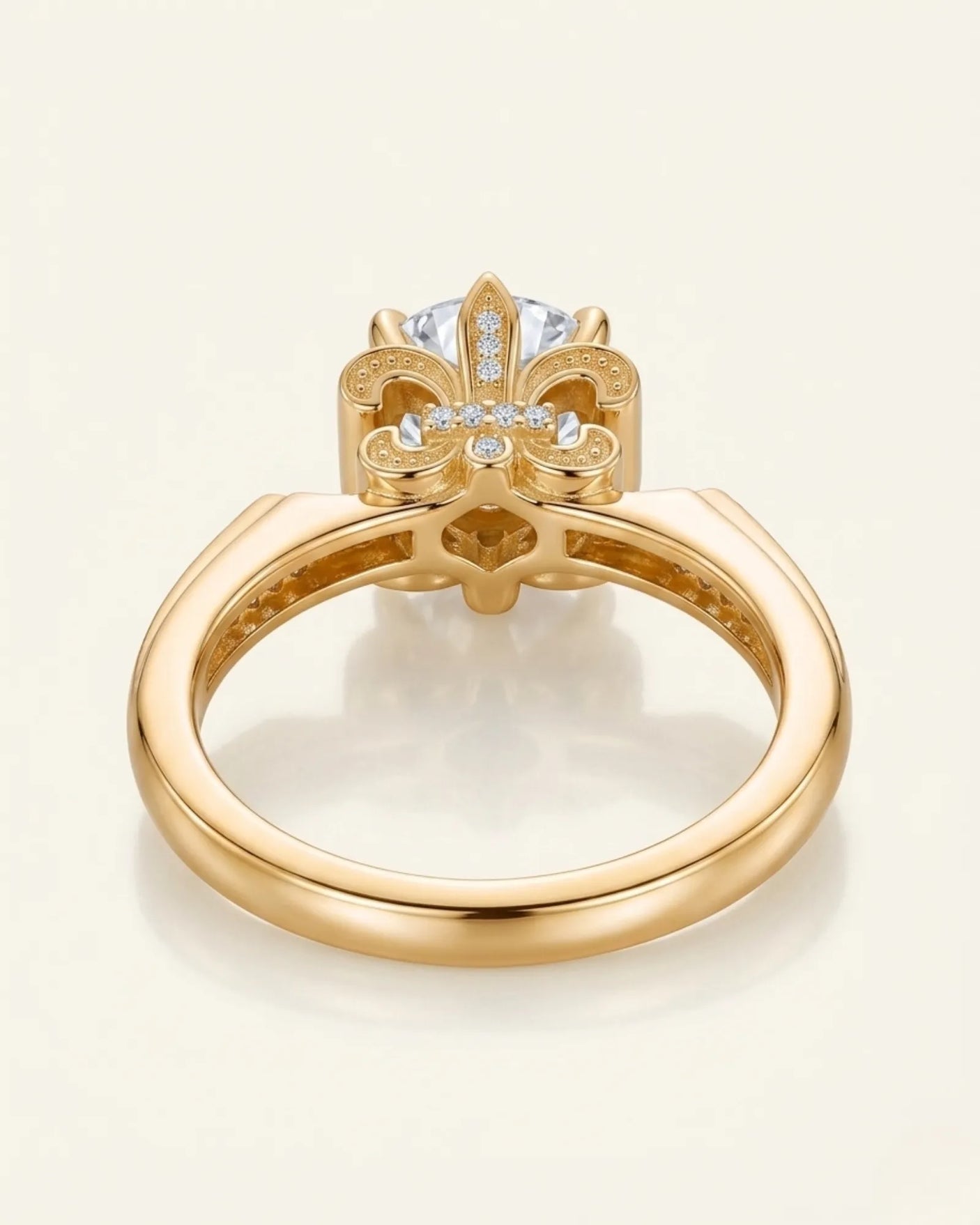 Luxury round moissanite ring with pavé accents and ornamental fleur-de-lis gallery crafted in 18K yellow gold - SARATTI