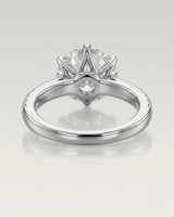 Luxury round moissanite ring with pavé shoulders and enduring platinum setting - SARATTI