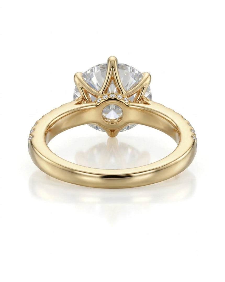 Luxury round moissanite ring with pavé shoulders and rich yellow gold setting - SARATTI