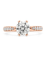 Luxury round moissanite ring with sculpted crown and warm romantic finish | SARATTI