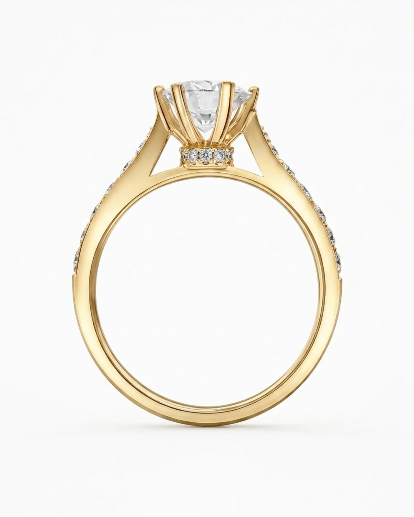 Luxury round moissanite ring with sculptural prongs and warm yellow gold finish | SARATTI
