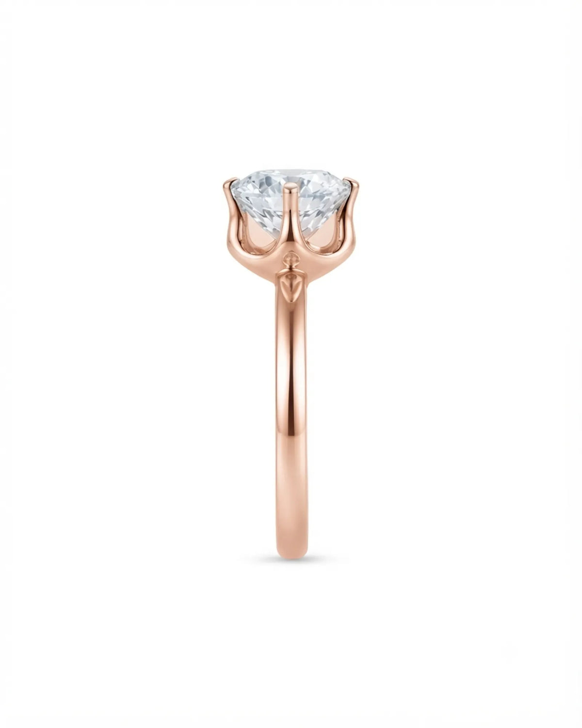 Luxury round moissanite solitaire in 18K rose gold with refined architectural setting | SARATTI