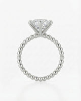 Luxury round moissanite solitaire in platinum with continuous polished bead band design | SARATTI