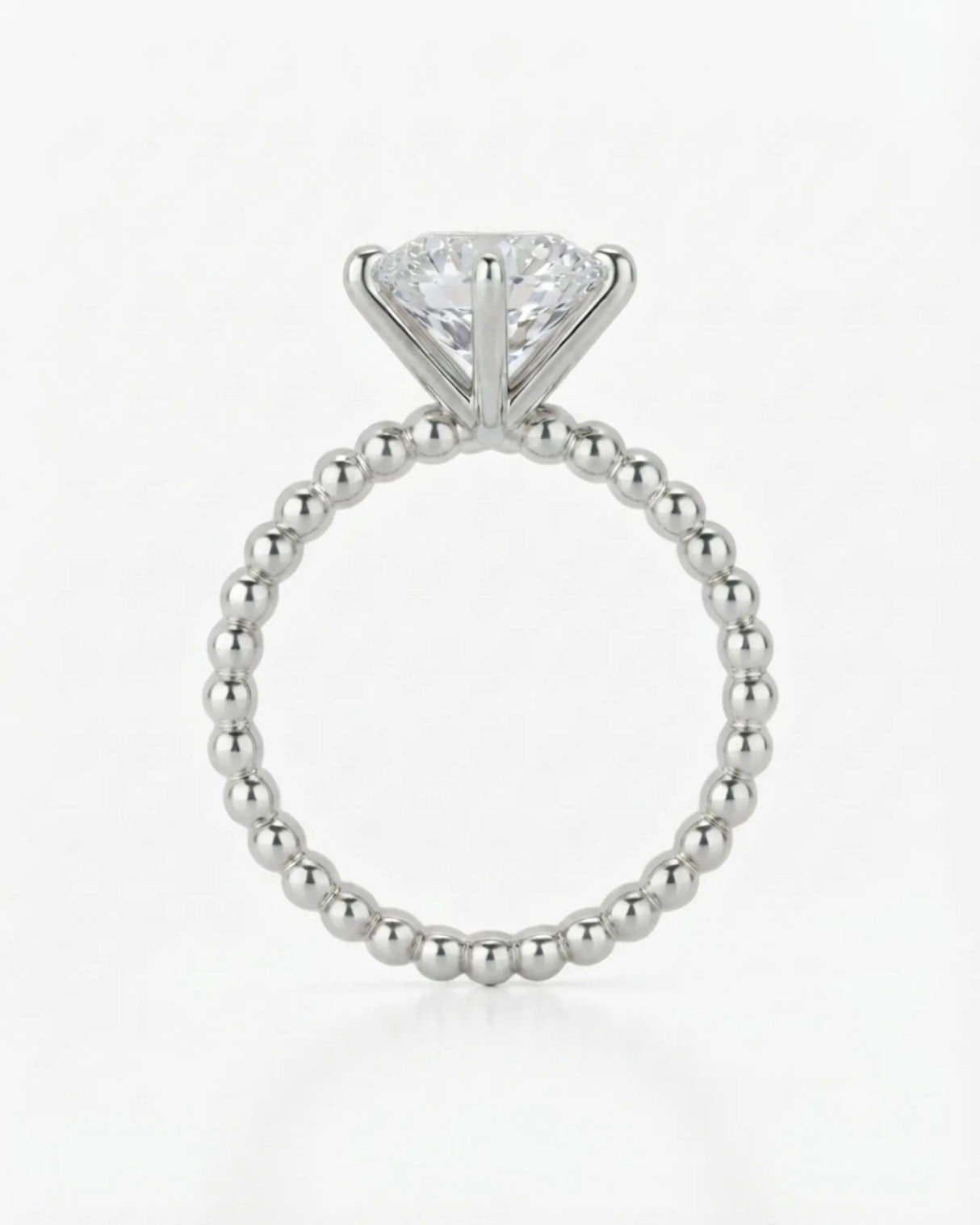 Luxury round moissanite solitaire in white gold with continuous polished bead band design | SARATTI