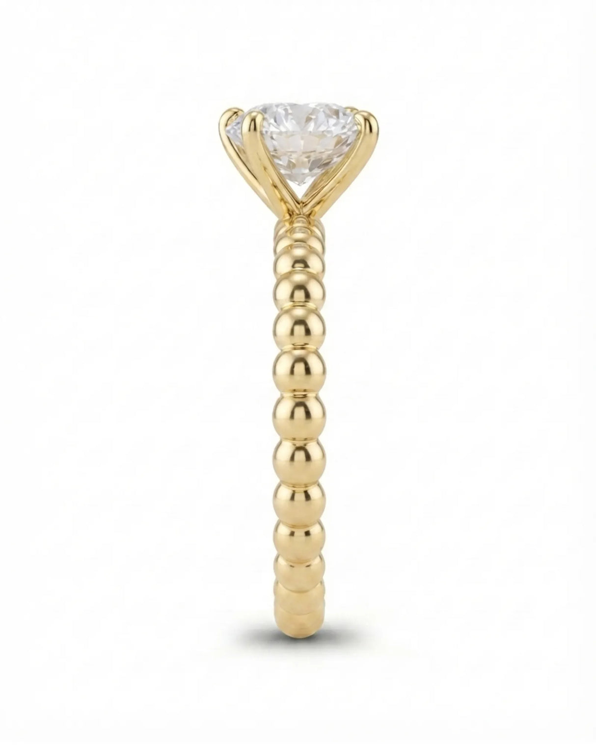 Luxury round moissanite solitaire in yellow gold with continuous polished bead band design | SARATTI