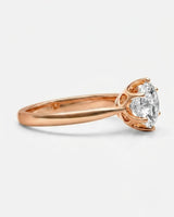 Luxury round moissanite solitaire ring in rose gold for refined engagement styling | SARATTI