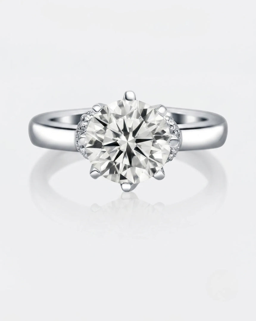Luxury round moissanite solitaire with vintage platinum basket and refined profile | SARATTI.