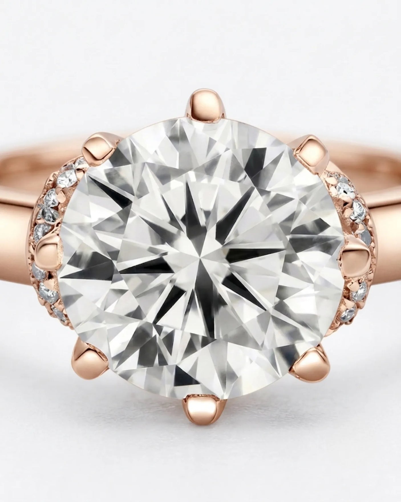 Luxury round moissanite solitaire with vintage rose gold basket and refined profile | SARATTI.