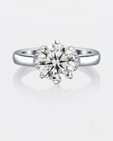 Luxury round moissanite solitaire with vintage white gold basket and refined profile | SARATTI.