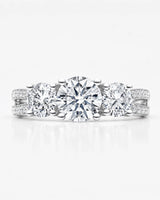 Luxury round moissanite split-shank ring with pavé shoulders in polished 18K white gold | SARATTI