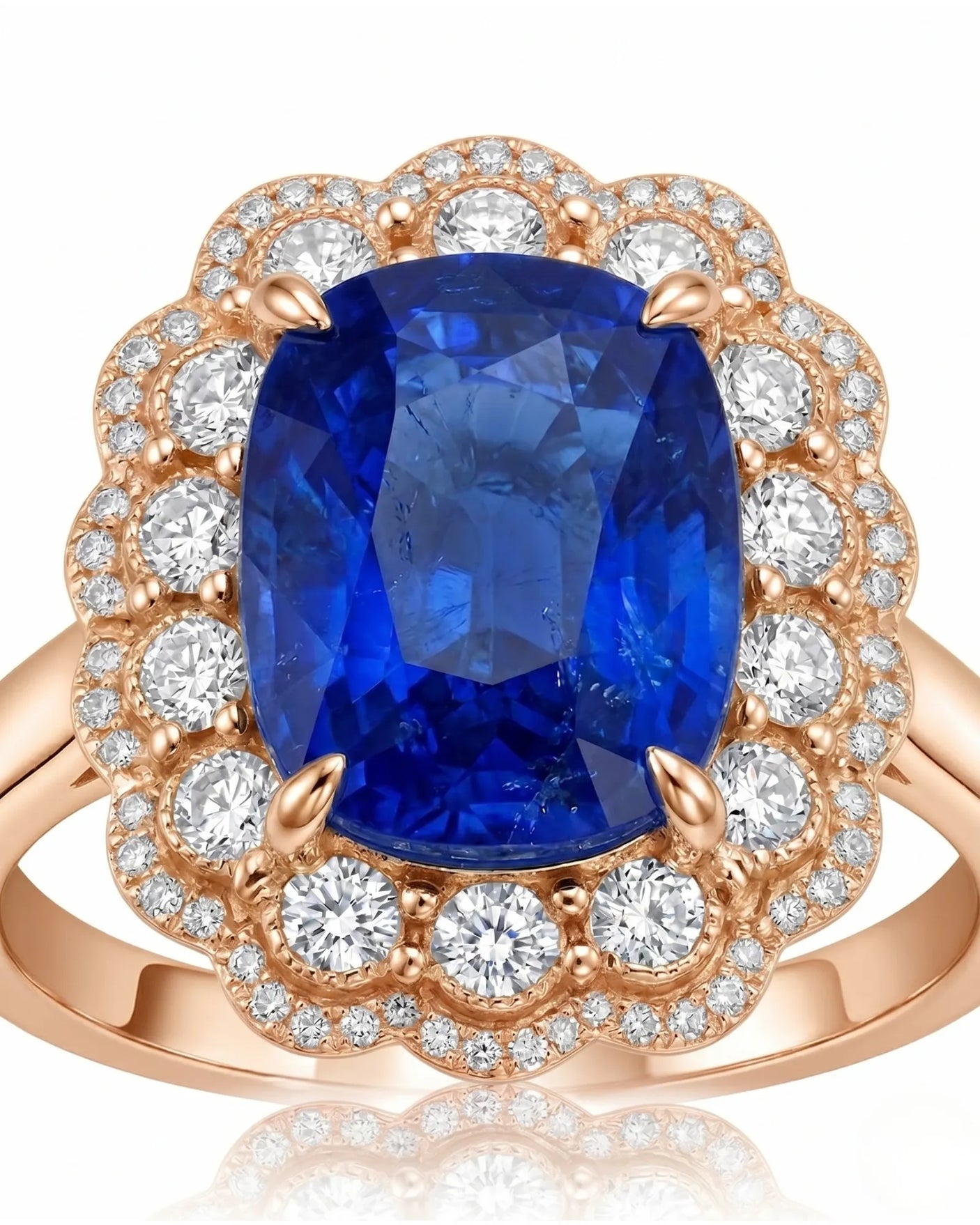 Luxury royal blue sapphire cocktail ring with diamond halo in 18K rose gold - SARATTI