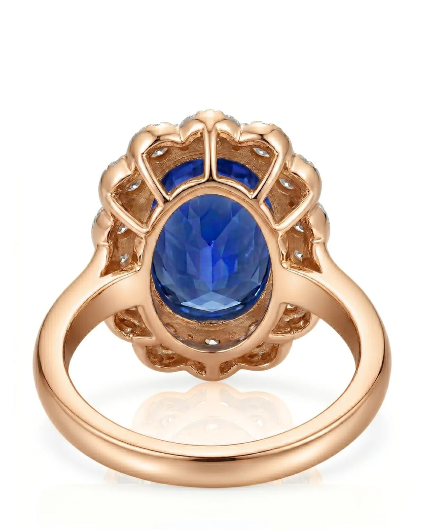 Luxury royal blue sapphire cocktail ring with diamond halo in 18K rose gold | SARATTI