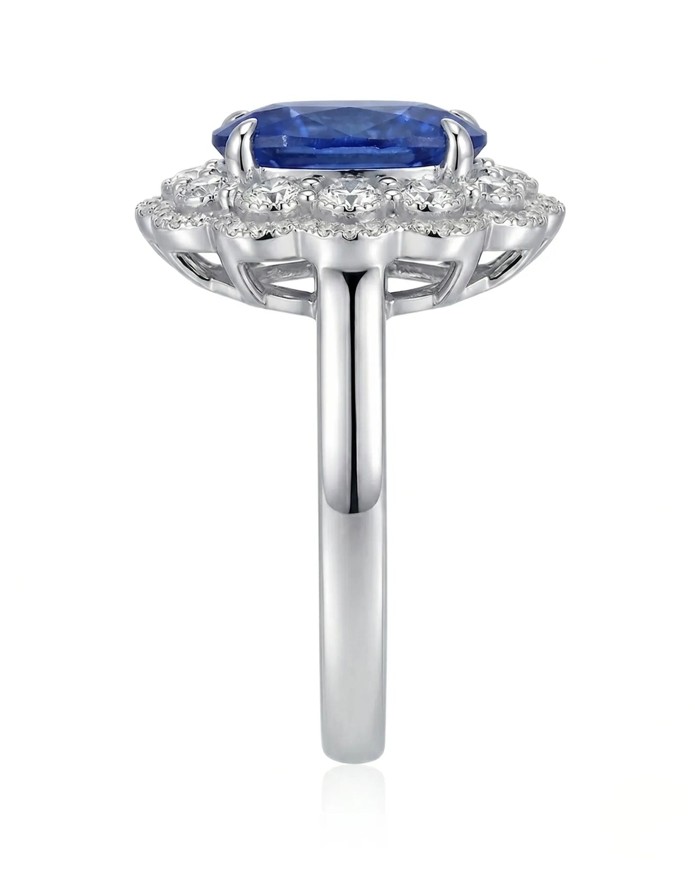 Luxury royal blue sapphire cocktail ring with diamond halo in 18K white gold - SARATTI