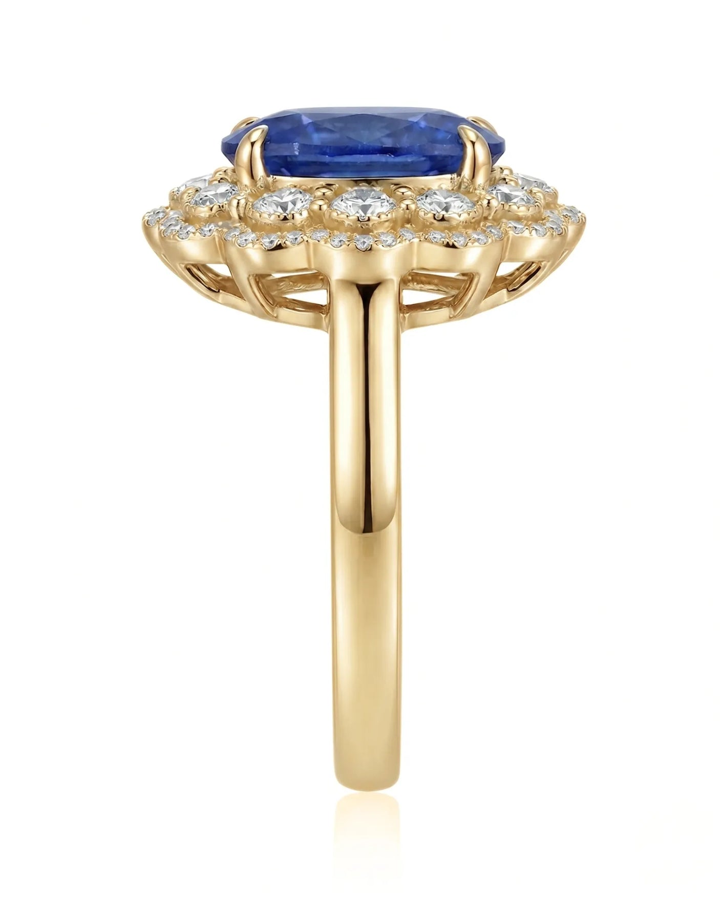Luxury royal blue sapphire cocktail ring with diamond halo in 18K yellow gold - SARATTI