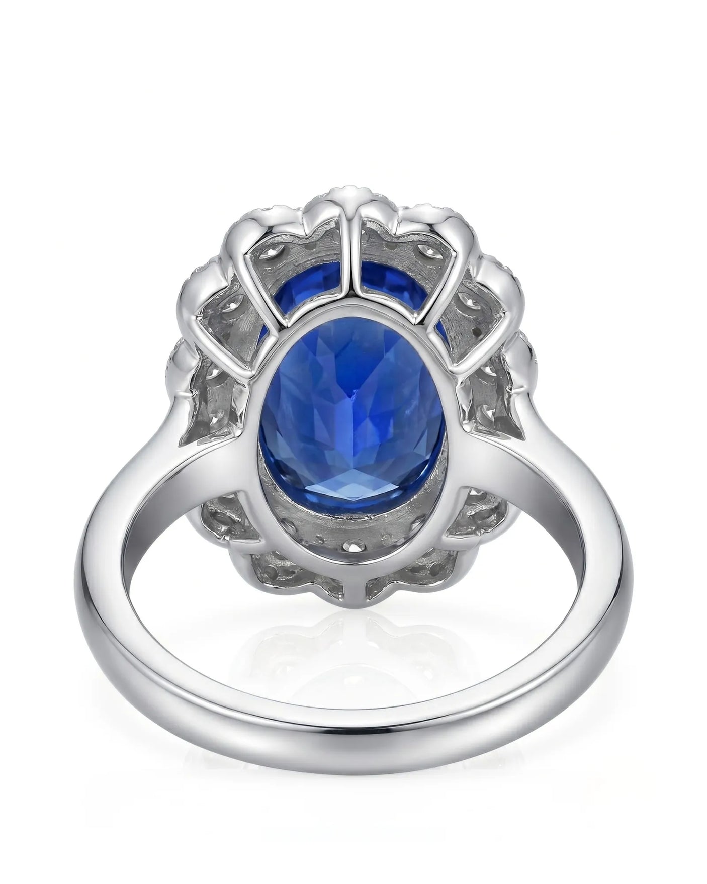 Luxury royal blue sapphire cocktail ring with diamond halo in platinum - SARATTI