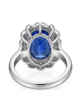 Luxury royal blue sapphire cocktail ring with diamond halo in platinum - SARATTI