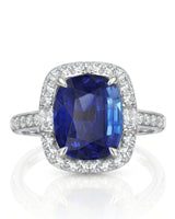Luxury royal blue sapphire ring with diamond shoulders in 18K white gold | SARATTI