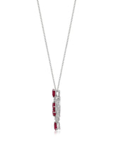Luxury ruby dreamcatcher pendant styled with elegant neutral clothing | SARATTI
