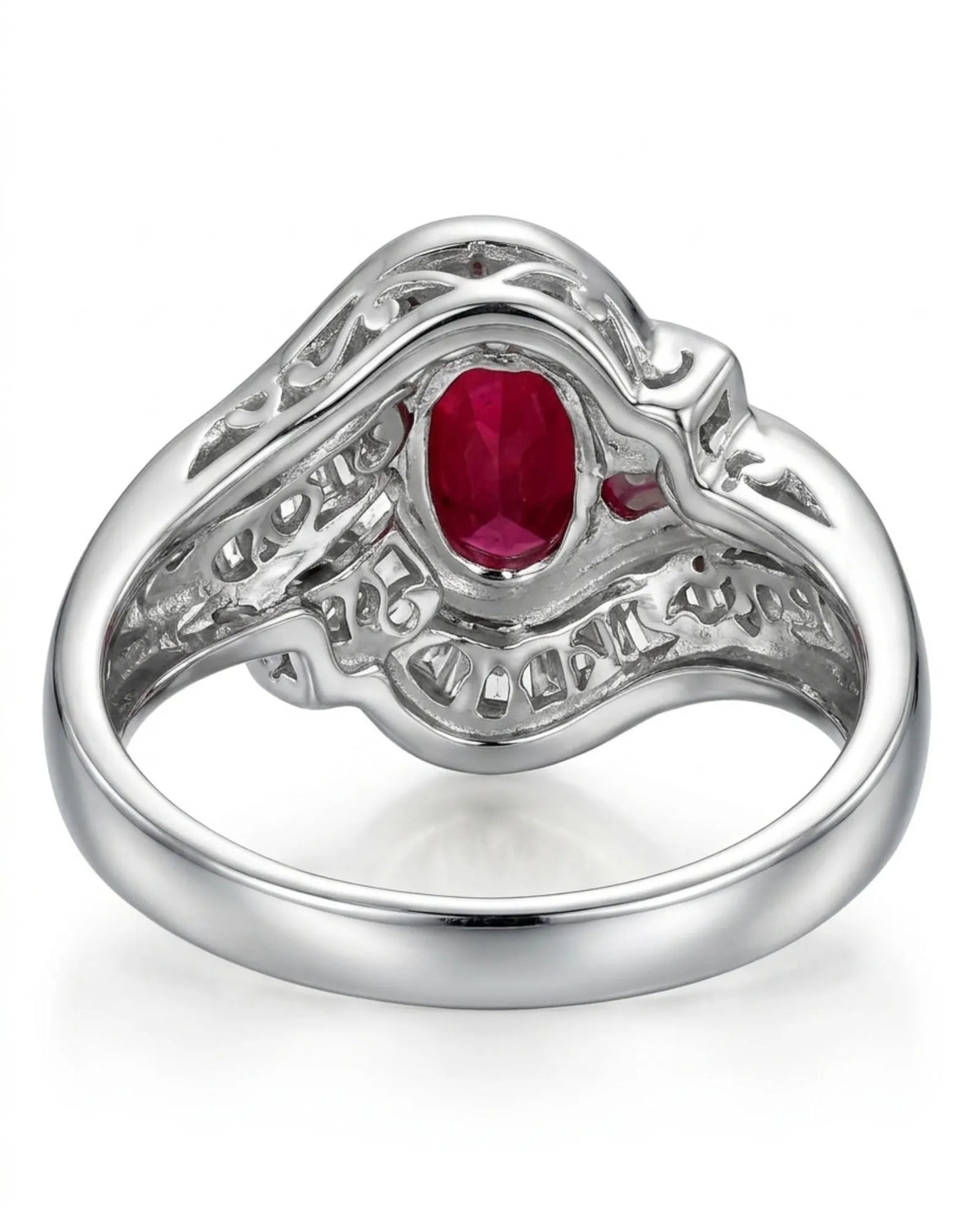 Luxury ruby ring with layered baguette diamond architecture and platinum craftsmanship | SARATTI
