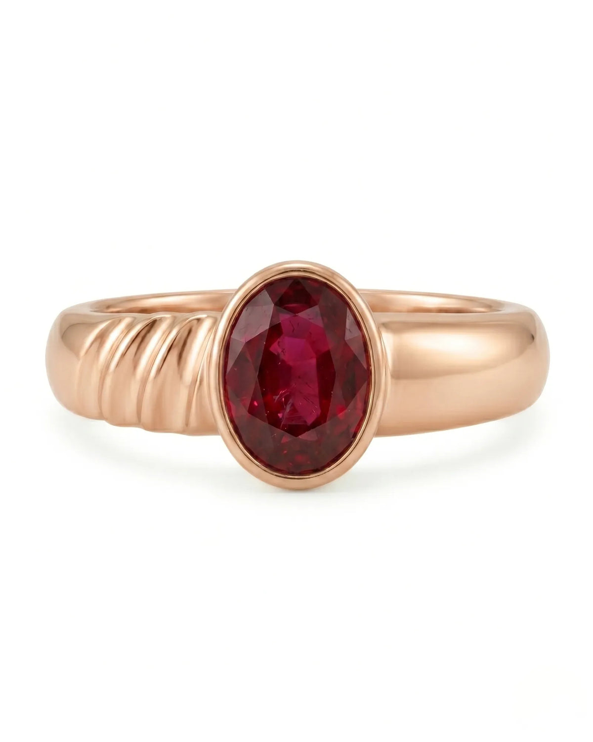 Luxury ruby solitaire ring in 18K rose gold with contemporary sculpted shoulders | SARATTI