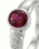 Luxury ruby solitaire ring in 18K white gold with contemporary sculpted shoulder detail | SARATTI