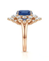 Luxury sapphire statement ring with diamond halo in 18K rose gold | SARATTI
