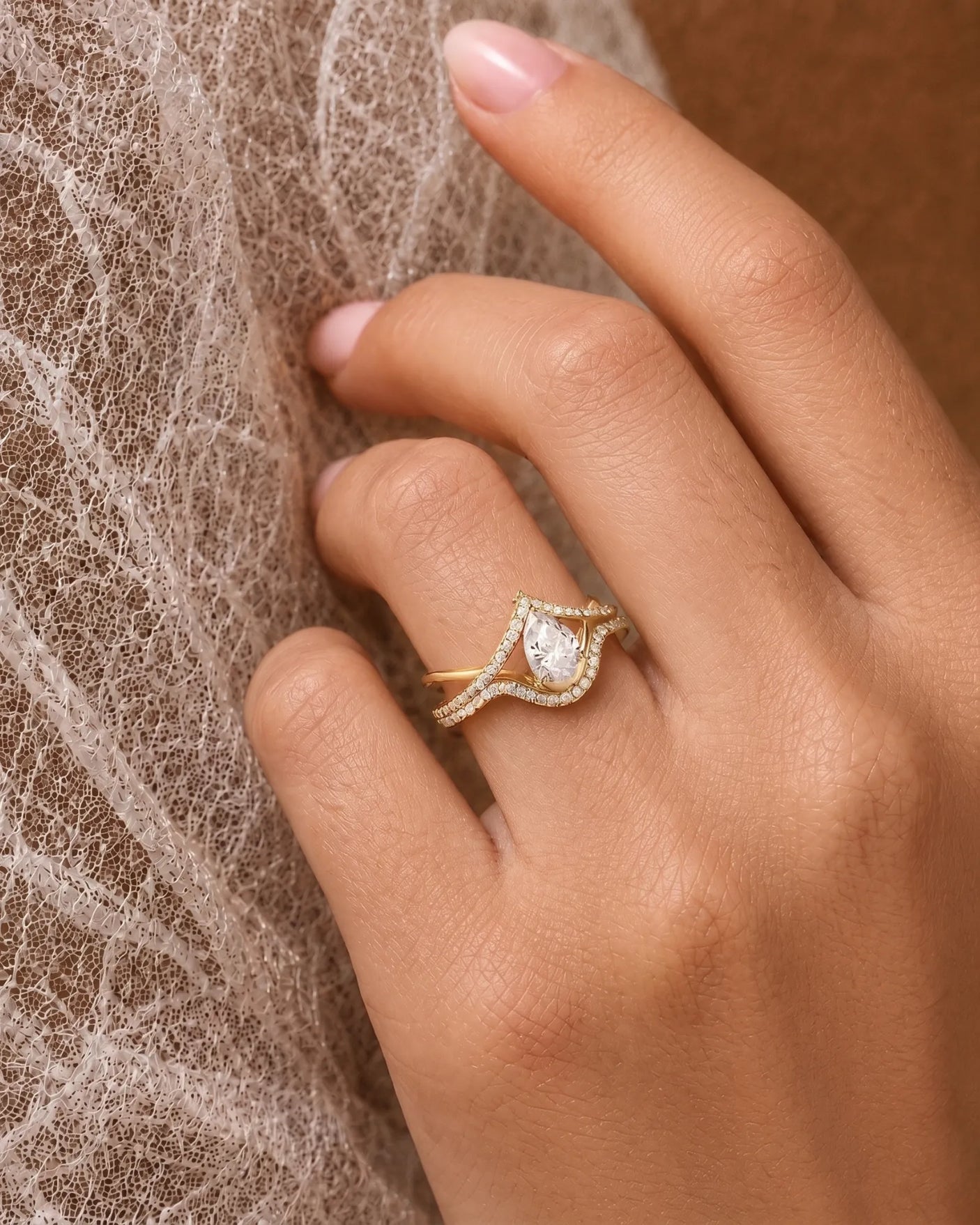 Luxury sculptural moissanite bridal set with layered bands crafted in rich 18K yellow gold - SARATTI