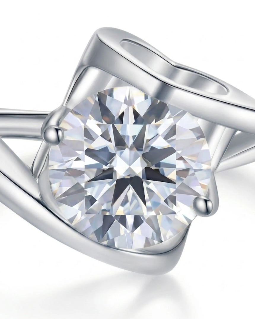 Luxury solitaire moissanite ring with avant-garde curves and refined 18K white gold craftsmanship | SARATTI
