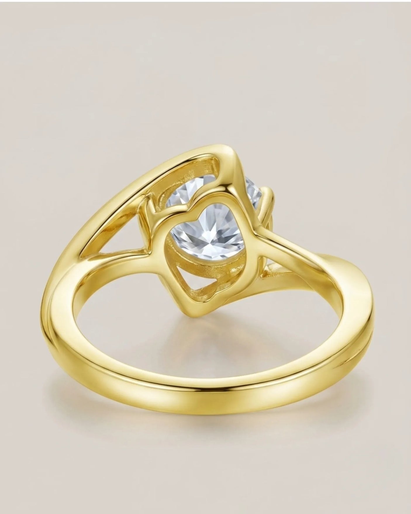 Luxury solitaire moissanite ring with avant-garde curves and rich 18K yellow gold craftsmanship - SARATTI