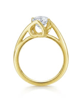 Luxury solitaire moissanite ring with avant-garde curves and rich 18K yellow gold craftsmanship | SARATTI