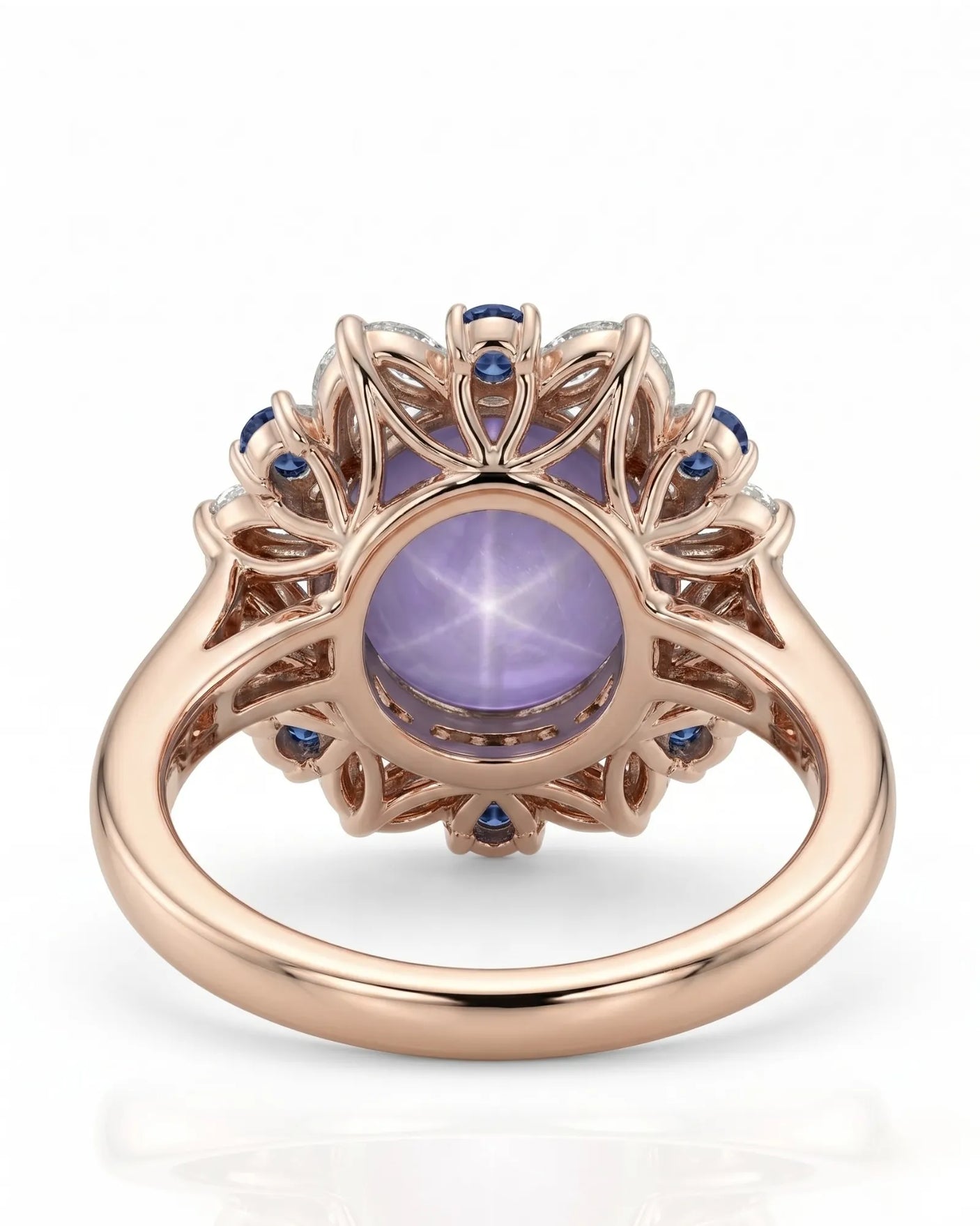 Luxury star sapphire ring with celestial diamond frame in 18K rose gold | SARATTI