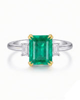 Luxury three stone emerald ring with baguette side diamonds in 18K White Gold | SARATTI