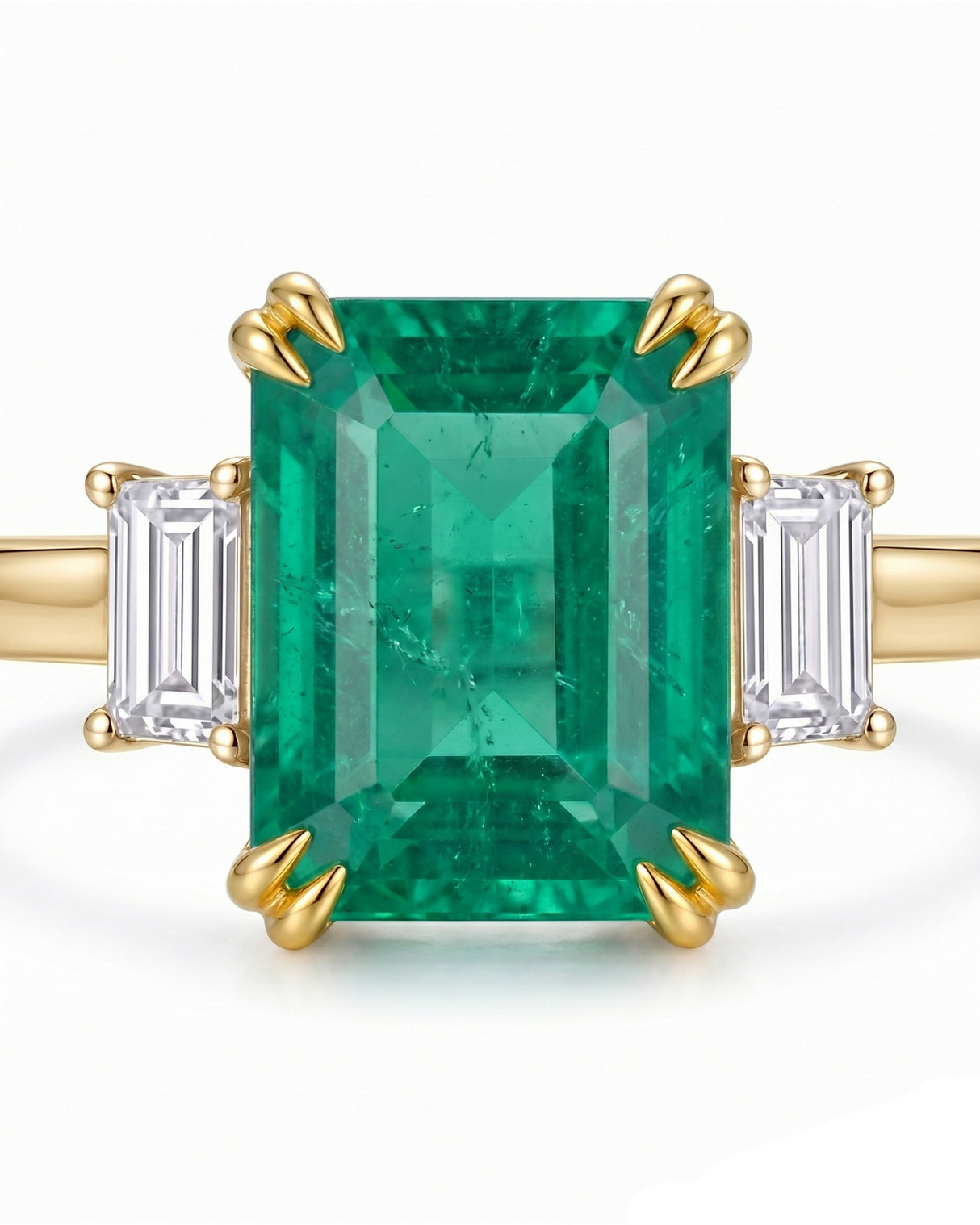 Luxury three stone emerald ring with baguette side diamonds in 18K Yellow Gold | SARATTI