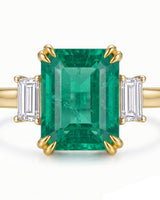 Luxury three stone emerald ring with baguette side diamonds in 18K Yellow Gold | SARATTI