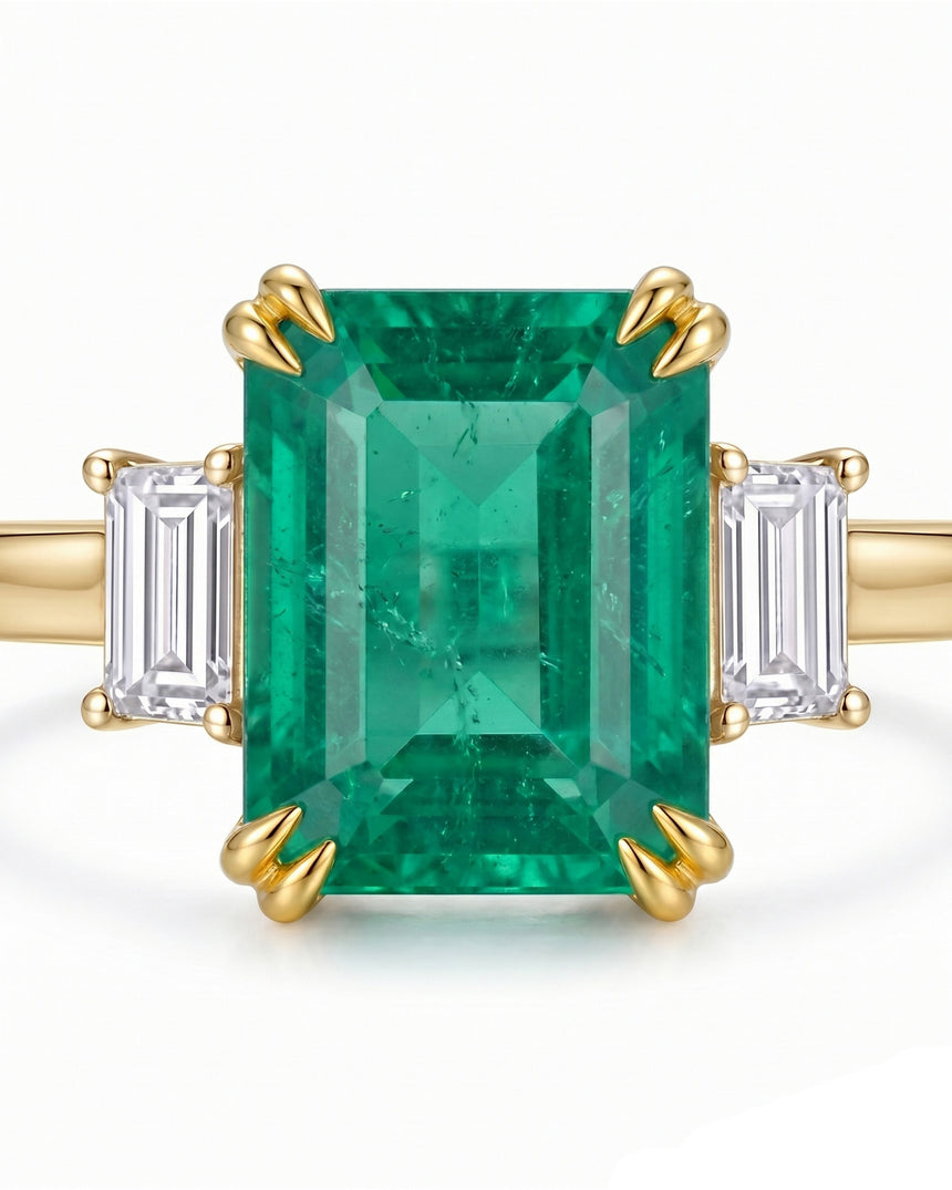 Luxury three stone emerald ring with baguette side diamonds in 18K Yellow Gold | SARATTI