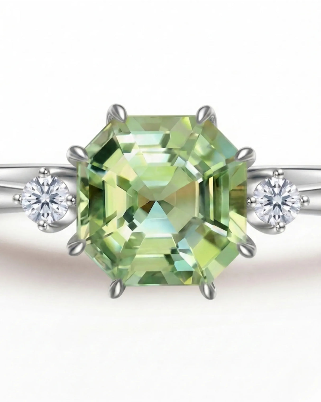 Luxury three stone green tourmaline ring with diamonds in 18K white gold | SARATTI