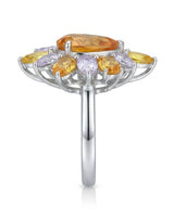 Luxury unheated yellow sapphire flower ring with elevated open multi-stone setting in platinum | SARATTI