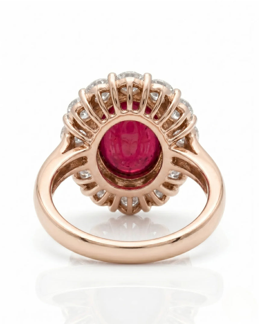 Luxury vintage ruby halo ring with diamond accents in polished rose gold | SARATTI