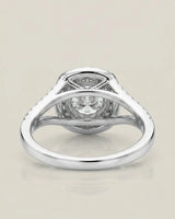 Luxury white gold halo bridal set with round moissanite center and seamless curved wedding band | SARATTI.