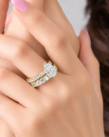 Luxury yellow gold pear cut moissanite ring with luminous side stones and elegant balance | SARATTI.