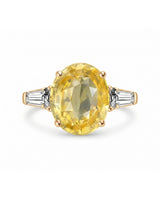 Luxury yellow sapphire three-stone ring with diamond accents in 18K yellow gold | SARATTI