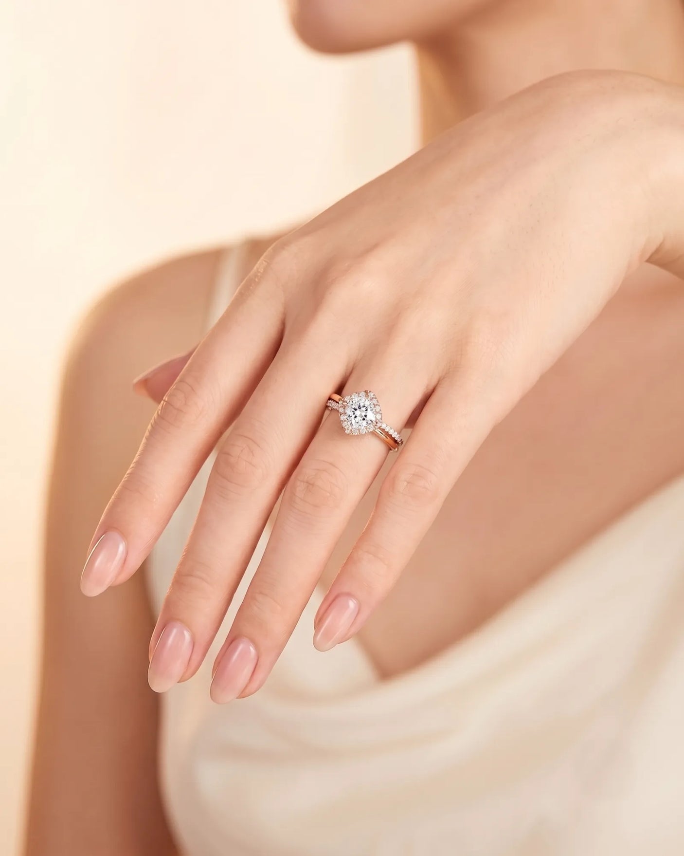 Renea – Majestic Grace Natural Round Diamond Two-Tone Halo Ring
