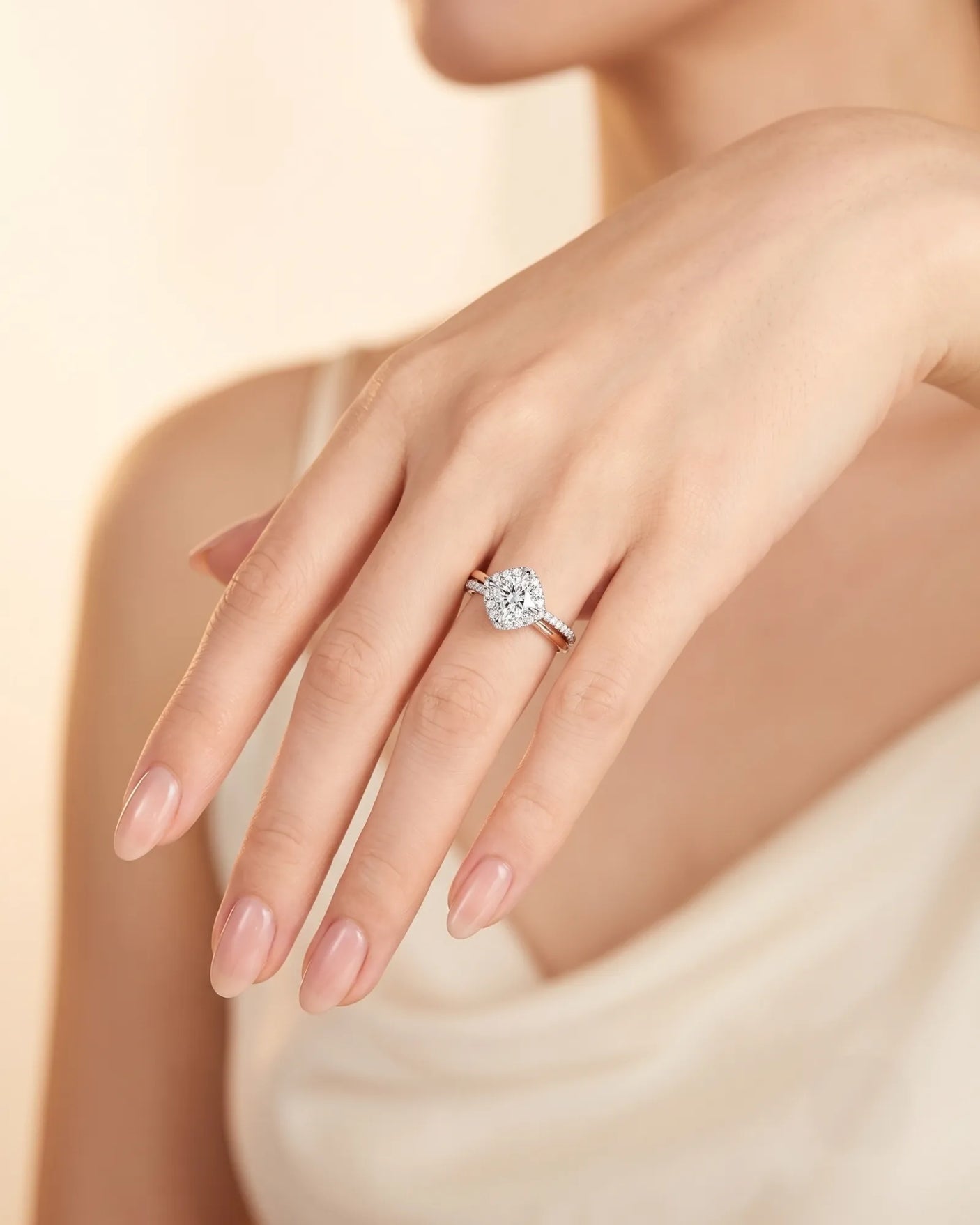 Renea – Majestic Grace Natural Round Diamond Two-Tone Halo Ring