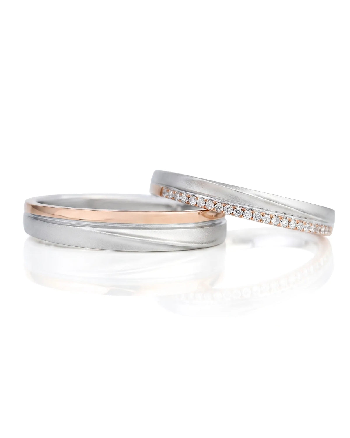 Matching wedding ring set with sculptural wave-inspired curves and refined 18K two tone gold craftsmanship | SARATTI