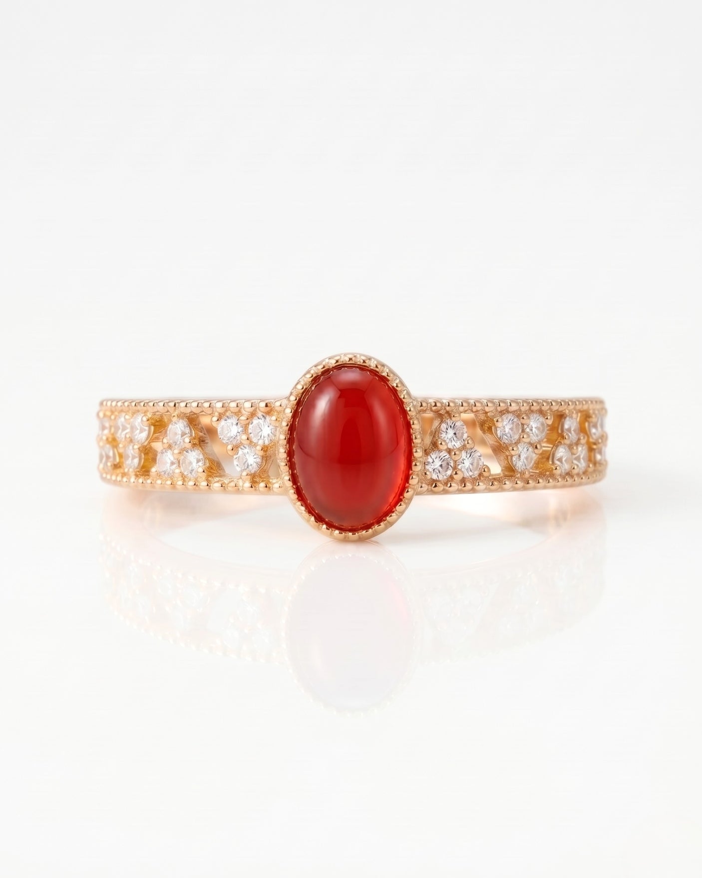 Milgrain ruby ring with round diamond accents and vintage openwork in 18K Rose Gold | SARATTI