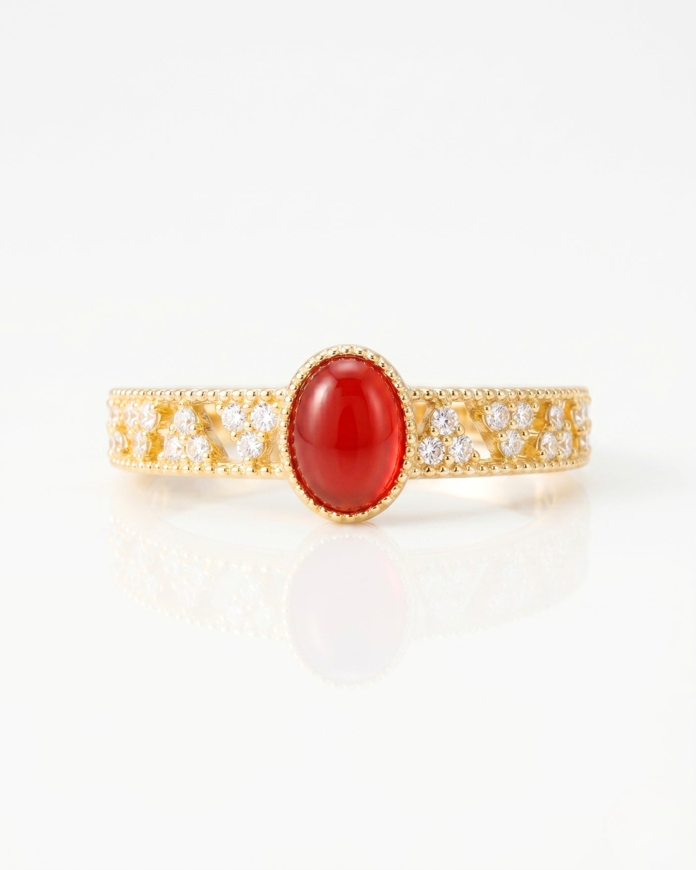 Milgrain ruby ring with round diamond accents and vintage openwork in 18K Yellow Gold | SARATTI