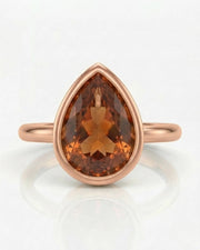 Minimal Build My Ring Topaz solitaire with smooth rose gold bezel | SARATTI
