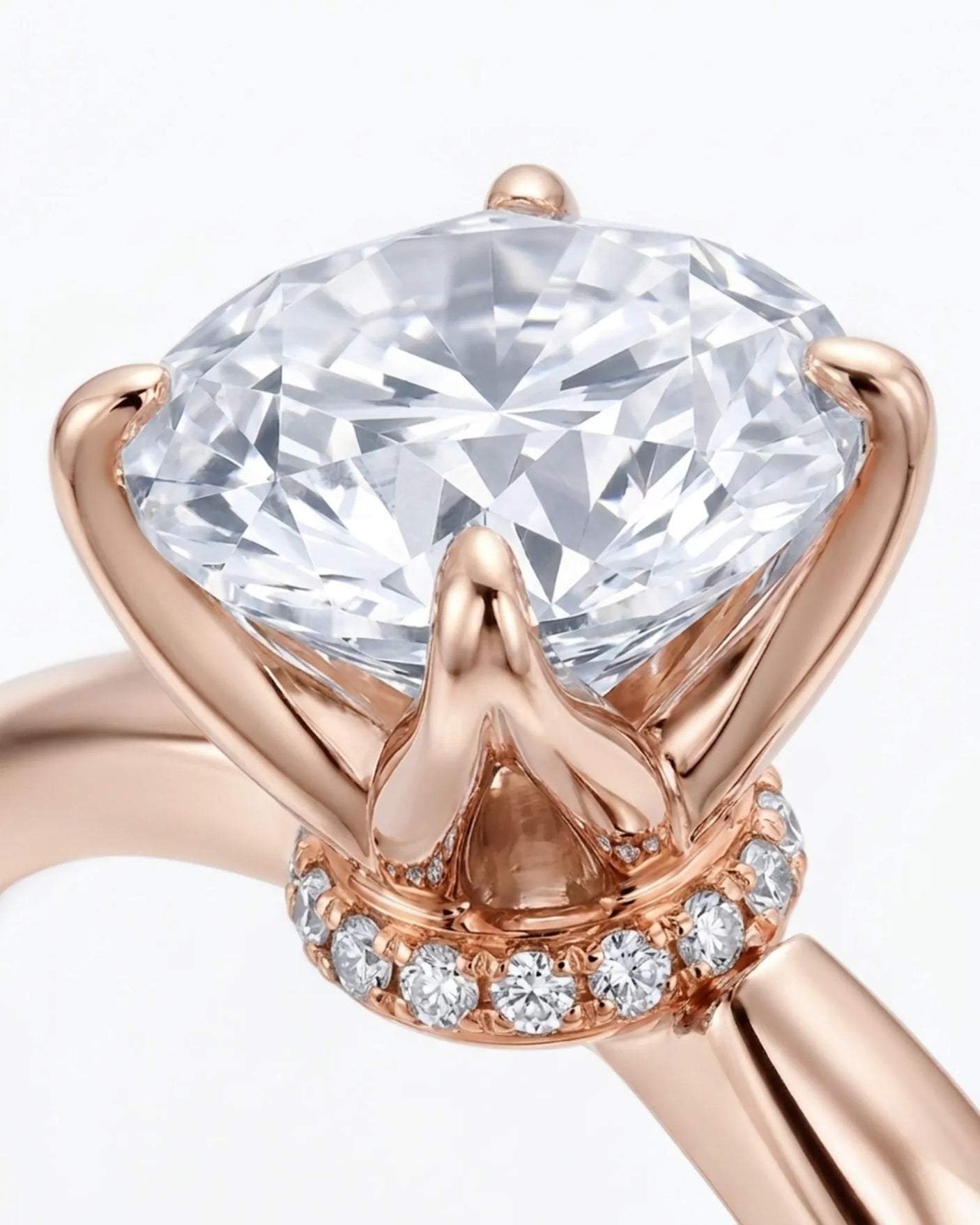 Minimal round moissanite ring with sculptural floral setting and polished rose gold band | SARATTI